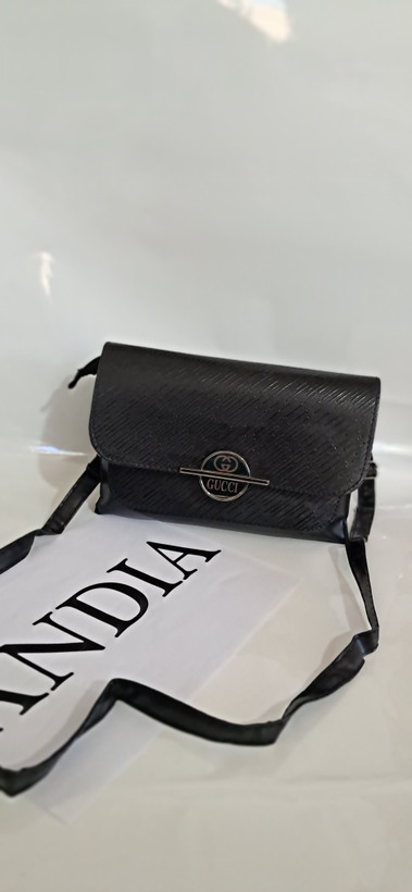 کیف مهلا جنس چرم طرحدار سایز ۱۵*۲۰