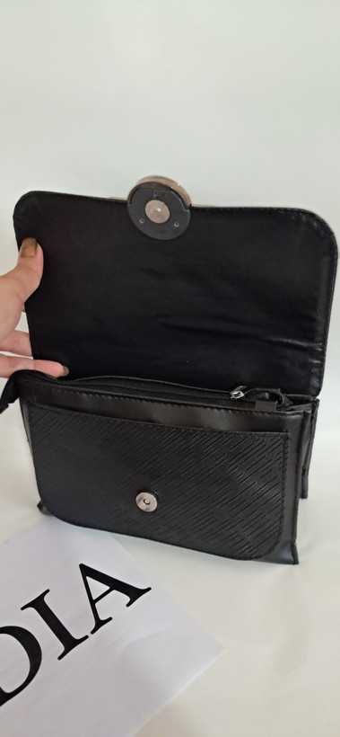 کیف مهلا جنس چرم طرحدار سایز ۱۵*۲۰